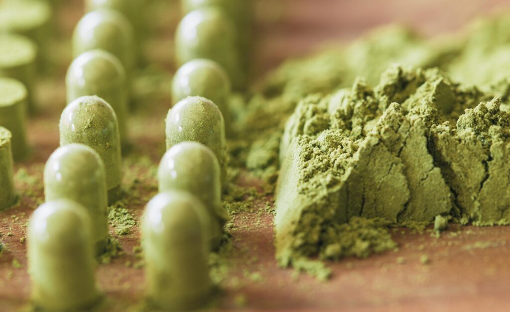 capsules of green powder